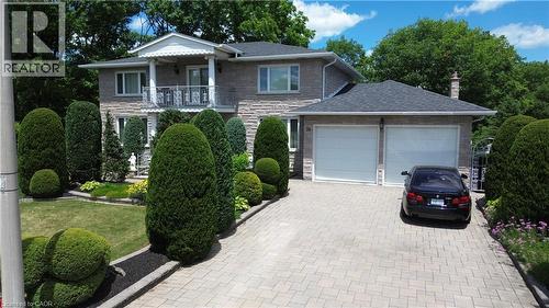 Stone facade with a prominent balcony and decorative railing - 35 Glen Park Court, Hamilton, ON - Outdoor