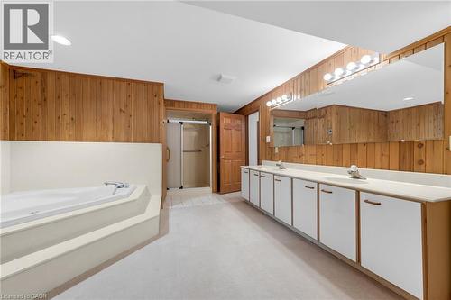 Double vanity with integrated sinks, ample counter space, and extensive cabinetry storage - 35 Glen Park Court, Hamilton, ON - Indoor