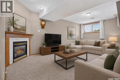 3547 Hazel Grove, Regina, SK - Indoor Photo Showing Living Room With Fireplace