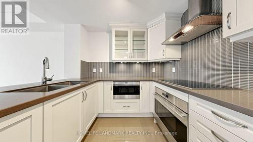 507 - 15 Stollery Pond Crescent, Markham, ON - Indoor Photo Showing Kitchen With Double Sink With Upgraded Kitchen