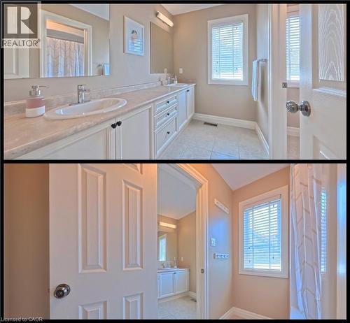 Property Image. Displaying a bathroom area with vanity, mirror, window, and shower curtain - 913 Valebrook Court, Kitchener, ON - Indoor Photo Showing Bathroom