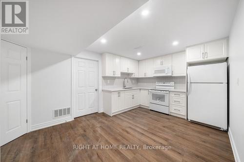 LOWER - 582 CARLYLE COURT , Oshawa, Ontario L1H 6S2 2