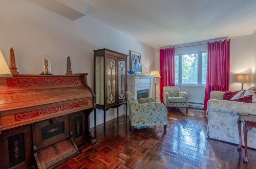 Salon - 3690 Crois. Oscar, Brossard, QC - Indoor Photo Showing Living Room With Fireplace