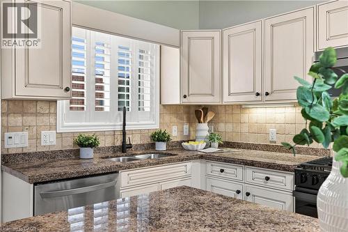 26 Welstead Drive, St. Catharines, ON - Indoor Photo Showing Kitchen With Double Sink