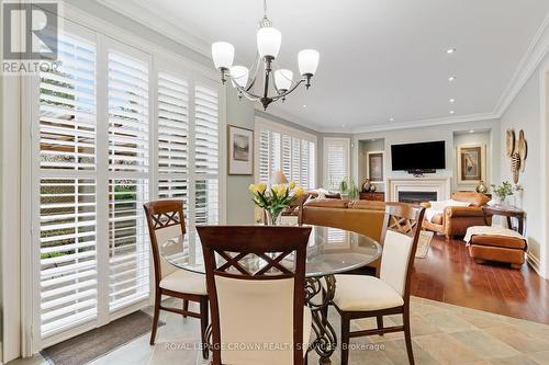150 Garth Massey Drive, Cambridge, ON - Indoor Photo Showing Dining Room With Fireplace