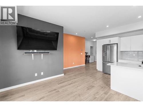 Virtually staged to showcase potential use of space - 2345 Butt Road Unit# 415, West Kelowna, BC - Indoor Photo Showing Kitchen