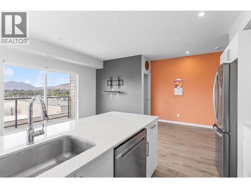 Virtually staged to showcase potential use of space - 2345 Butt Road Unit# 415, West Kelowna, BC - Indoor Photo Showing Kitchen