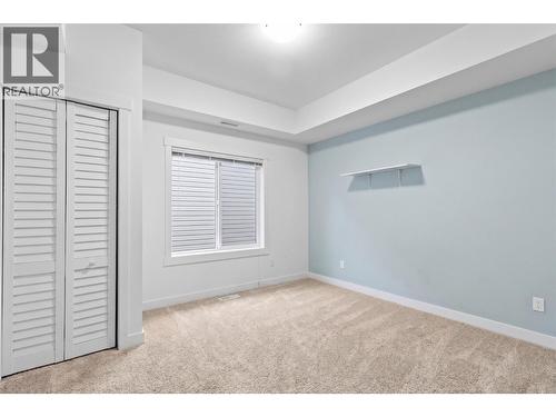 Virtually staged to showcase potential use of space - 2345 Butt Road Unit# 415, West Kelowna, BC - Indoor Photo Showing Other Room