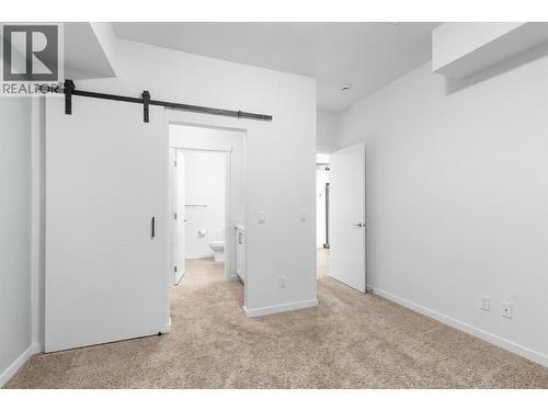 Virtually staged to showcase potential use of space - 2345 Butt Road Unit# 415, West Kelowna, BC - Indoor Photo Showing Other Room