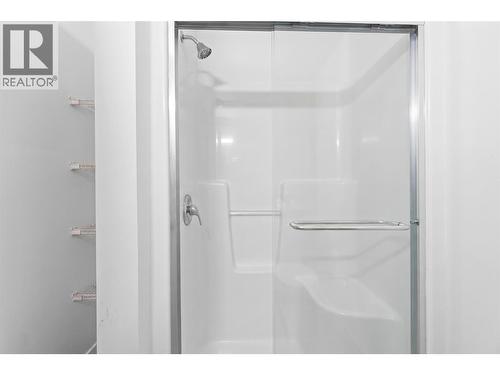 Virtually staged to showcase potential use of space - 2345 Butt Road Unit# 415, West Kelowna, BC - Indoor Photo Showing Bathroom