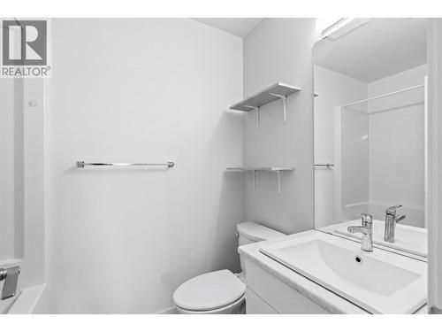 Virtually staged to showcase potential use of space - 2345 Butt Road Unit# 415, West Kelowna, BC - Indoor Photo Showing Bathroom