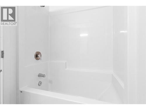 Virtually staged to showcase potential use of space - 2345 Butt Road Unit# 415, West Kelowna, BC - Indoor Photo Showing Bathroom
