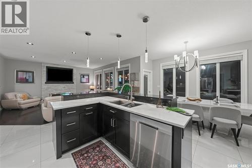 107 Schumacher Bay, Saskatoon, SK - Indoor Photo Showing Kitchen With Double Sink With Upgraded Kitchen