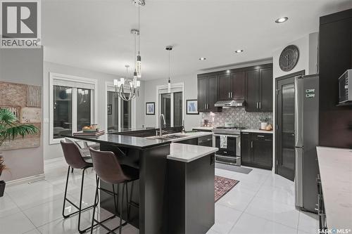 107 Schumacher Bay, Saskatoon, SK - Indoor Photo Showing Kitchen With Upgraded Kitchen