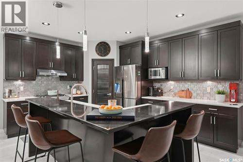 107 Schumacher Bay, Saskatoon, SK - Indoor Photo Showing Kitchen With Upgraded Kitchen