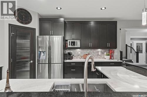 107 Schumacher Bay, Saskatoon, SK - Indoor Photo Showing Kitchen With Upgraded Kitchen