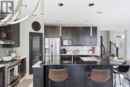 107 Schumacher Bay, Saskatoon, SK - Indoor Photo Showing Kitchen With Upgraded Kitchen