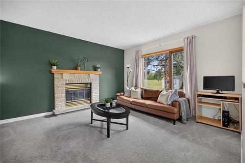 73 High Ridge Rd, Winnipeg, MB - Indoor Photo Showing Living Room With Fireplace