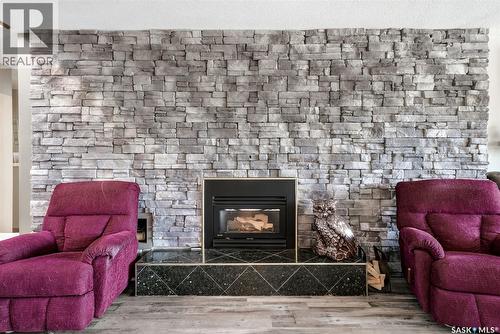 210 Pleasant Avenue, Buena Vista, SK - Indoor Photo Showing Living Room With Fireplace