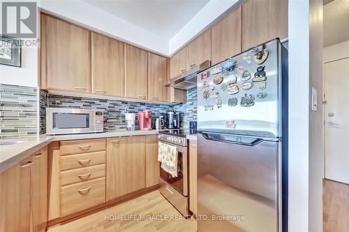 712 - 38 Lee Centre Drive, Toronto, ON - Indoor Photo Showing Kitchen