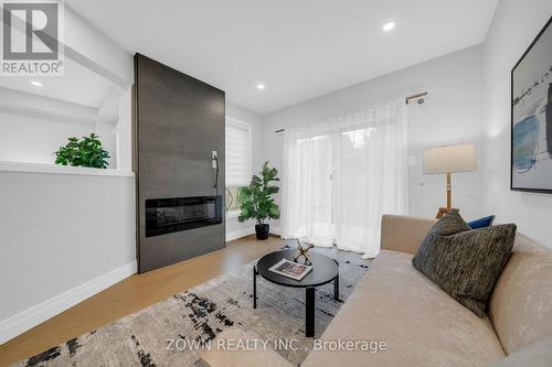 5253 Bushelgrove Circle, Mississauga, ON - Indoor Photo Showing Living Room With Fireplace