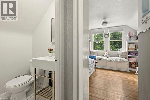 White wall paint and wood-finish flooring - 23 Kipling Road, Hamilton, ON - Indoor Photo Showing Bathroom