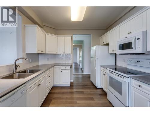 1962 Enterprise Way Unit# 401, Kelowna, BC - Indoor Photo Showing Kitchen With Double Sink
