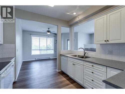 1962 Enterprise Way Unit# 401, Kelowna, BC - Indoor Photo Showing Kitchen With Double Sink