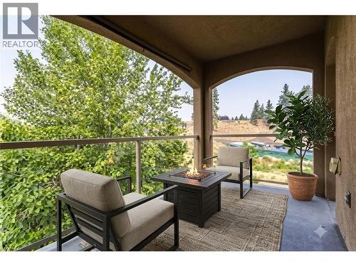 Covered Deck Virtually Staged - 1962 Enterprise Way Unit# 401, Kelowna, BC - Outdoor With Deck Patio Veranda With Exterior