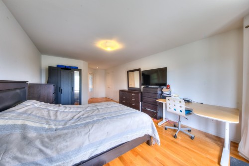 Chambre à coucher - 6565 Rue Corelli, Brossard, QC - Indoor Photo Showing Bedroom