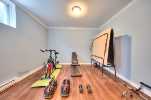 Sous-sol - 6565 Rue Corelli, Brossard, QC - Indoor Photo Showing Gym Room