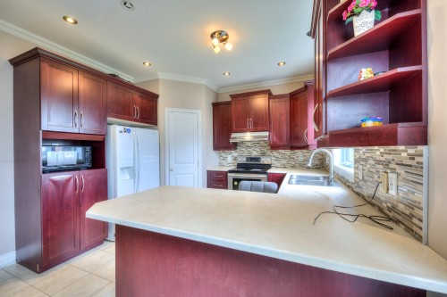 Cuisine - 6565 Rue Corelli, Brossard, QC - Indoor Photo Showing Kitchen With Double Sink