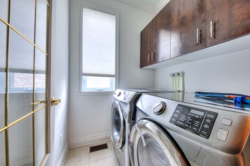 Salle de lavage - 6565 Rue Corelli, Brossard, QC - Indoor Photo Showing Laundry Room