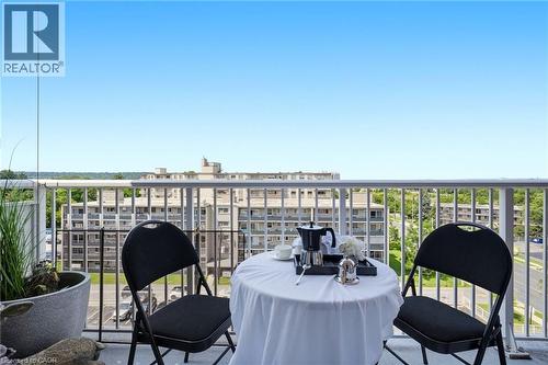 Balcony with metal railings and concrete flooring - 8 Woodman Drive S Unit# 708, Hamilton, ON - Outdoor With Balcony