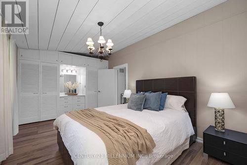 2nd Main Floor Bedroom with Build-Ins - 9135 Sideroad 24 Side Road, Erin, ON - Indoor Photo Showing Bedroom