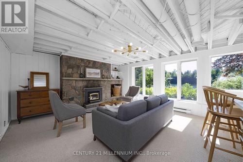 Lower Level Family Room with Fireplace - 9135 Sideroad 24 Side Road, Erin, ON - Indoor Photo Showing Other Room With Fireplace