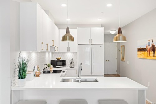 #303-2348 Beacon Ave, Sidney, BC - Indoor Photo Showing Kitchen With Double Sink With Upgraded Kitchen