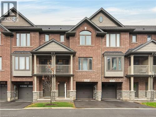 Brick townhouse exterior with multiple gables and dormers - 19 Picardy Drive Unit# 13, Hamilton, ON - Outdoor With Facade