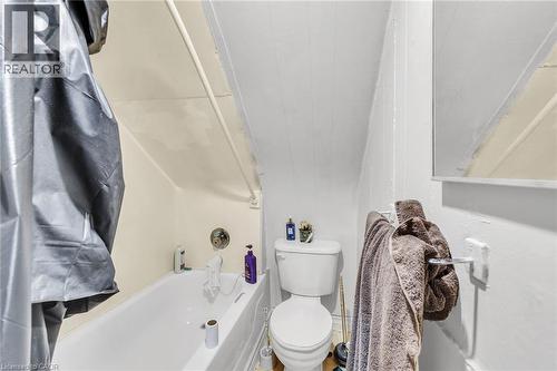 White porcelain toilet - 1367 Cannon Street E, Hamilton, ON - Indoor Photo Showing Bathroom
