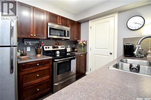 308 306 Petterson Drive, Estevan, SK - Indoor Photo Showing Kitchen With Double Sink