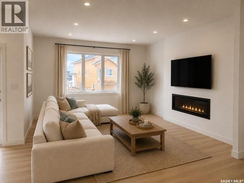 310 Nazarali Avenue, Saskatoon, SK - Indoor Photo Showing Living Room With Fireplace