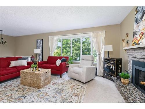 32 Tulip St, Fredericton, NB - Indoor Photo Showing Living Room With Fireplace