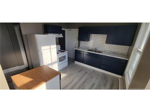 130-132 Broad St, Saint John, NB - Indoor Photo Showing Kitchen With Double Sink
