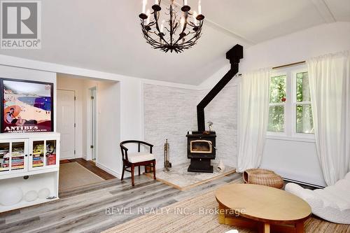 39 Domar Road, Tiny, ON - Indoor With Fireplace