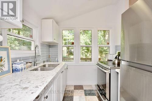 39 Domar Road, Tiny, ON - Indoor Photo Showing Kitchen With Double Sink With Upgraded Kitchen