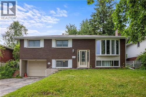 Brick exterior with white window shutters - 695 Glen Forrest Boulevard Unit# Upper, Waterloo, ON - Outdoor