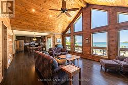 OPEN TO THE DINING AREA & KITCHEN - 
