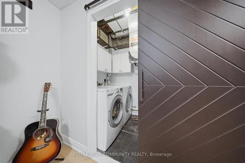 11 - 210 Manitoba Street, Toronto, ON - Indoor Photo Showing Laundry Room