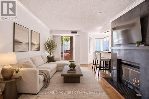 This image is virtually staged. - 101 - 45 Argyle Avenue, Ottawa, ON - Indoor Photo Showing Living Room With Fireplace