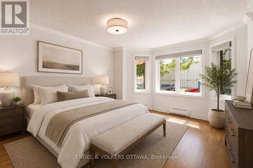 This image is virtually staged. - 101 - 45 Argyle Avenue, Ottawa, ON - Indoor Photo Showing Bedroom